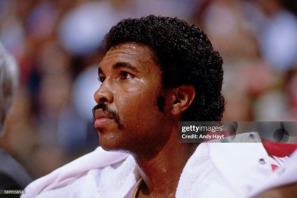 Houston Rockets: Robert Reid HOUSTON, TX - 1980: Robert Reid #50 of the Houston Rockets looks on during a game circa 1980 in Houston, Texas. NOTE TO USER: User expressly acknowledges and agrees that, by downloading and/or using this Photograph, User is consenting to the terms and conditions of the Getty Images License Agreement. Mandatory Copyright Notice: Copyright 1980 NBAE (Photo by Andy Hayt/NBAE via Getty Images)