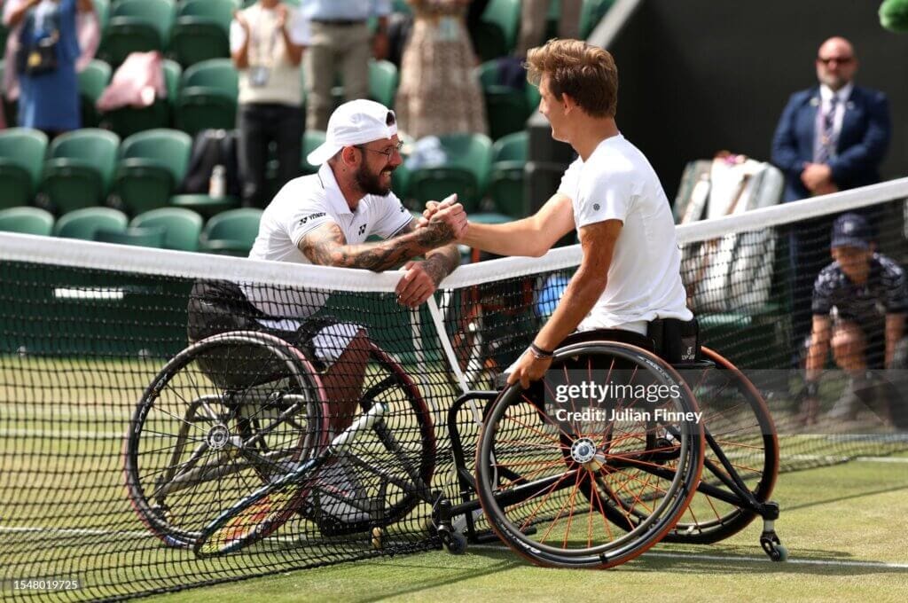 Day Fourteen: The Championships - Wimbledon 2023 LONDON, ENGLAND - JULY 16: Niels Vink of Netherlands (R) meets Heath Davidson of Australia (L) at the net following his victory in the Quad Wheelchair Singles Final on day fourteen of The Championships Wimbledon 2023 at All England Lawn Tennis and Croquet Club on July 16, 2023 in London, England. (Photo by Julian Finney/Getty Images)