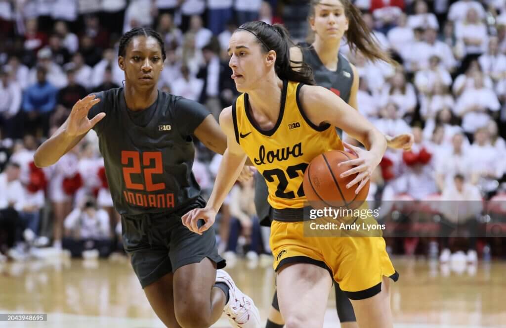 Iowa v Indiana BLOOMINGTON, INDIANA - FEBRUARY 22: Caitlin Clark #22 of the Iowa Hawkeyes dribbles the ball in the first half against the Indiana Hoosiers at Simon Skjodt Assembly Hall on February 22, 2024 in Bloomington, Indiana. (Photo by Andy Lyons/Getty Images)
