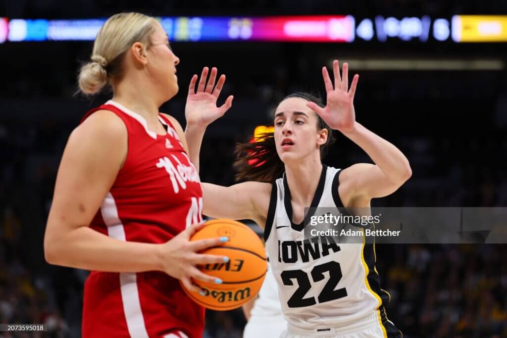 Big Ten Women's Basketball Tournament - ChampionshipMINNEAPOLIS, MINNESOTA - MARCH 10: Caitlin Clark #22 of the Iowa Hawkeyes defends Alexis Markowski #40 of the Nebraska Cornhuskers in the first half during the Big Ten Women's Basketball Tournament Championship at Target Center on March 10, 2024 in Minneapolis, Minnesota. (Photo by Adam Bettcher/Getty Images)