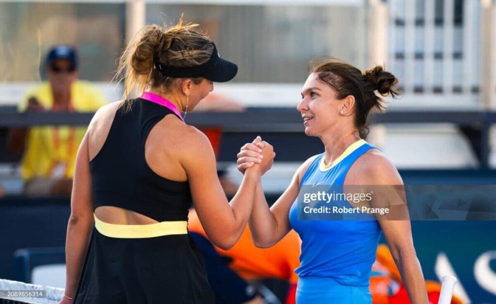 Miami Open Presented by Itau 2024 - Day 4 MIAMI GARDENS, FLORIDA - MARCH 19: Paula Badosa of Spain and Simona Halep of Romania meet at the net after the first round on Day 4 of the Miami Open Presented by Itau at Hard Rock Stadium on March 19, 2024 in Miami Gardens, Florida(Photo by Robert Prange/Getty Images)