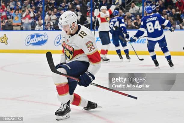 The Florida Panthers and Steven Lorentz #18 celebrate another goal and victory against cross-state rivals, the Tampa Bay Lightning.