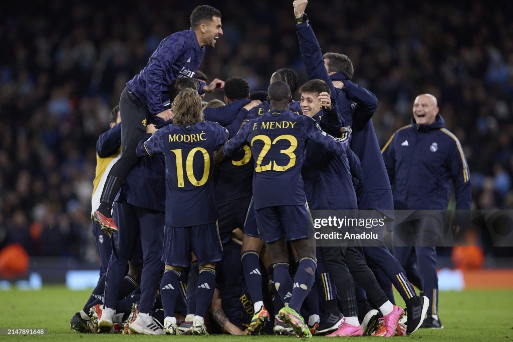 Real Madrid celebrating their victory against Man City