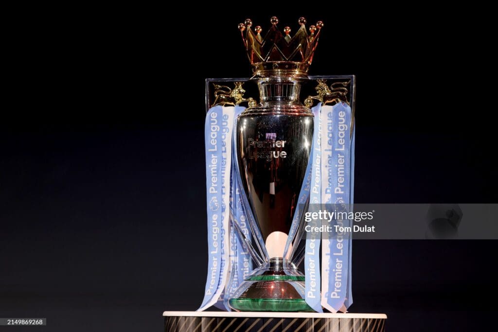 Premier League trophy with blue ribbon