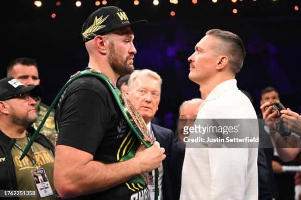 Tyson Fury (left) facing off with Oleksandr Usyk (right)