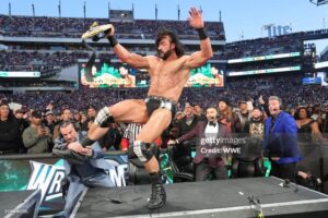 WWE Superstar Drew McIntyre being attacked by CM Punk