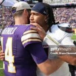 Minnesota Vikings QB Sam Darnold embraces CJ Stroud after a dominant victory by the Vikings