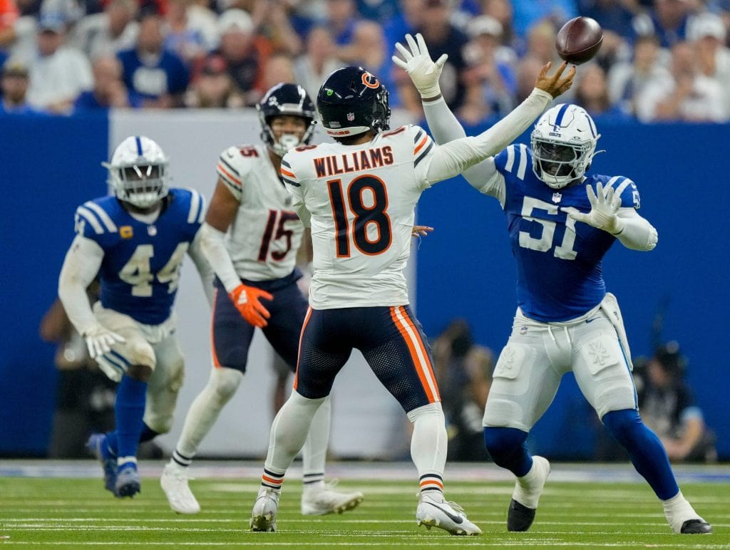 Indianapolis Colts defensive end Kwity Paye (51) pressures Chicago Bears quarterback Caleb Williams (18) on Sunday, Sept.