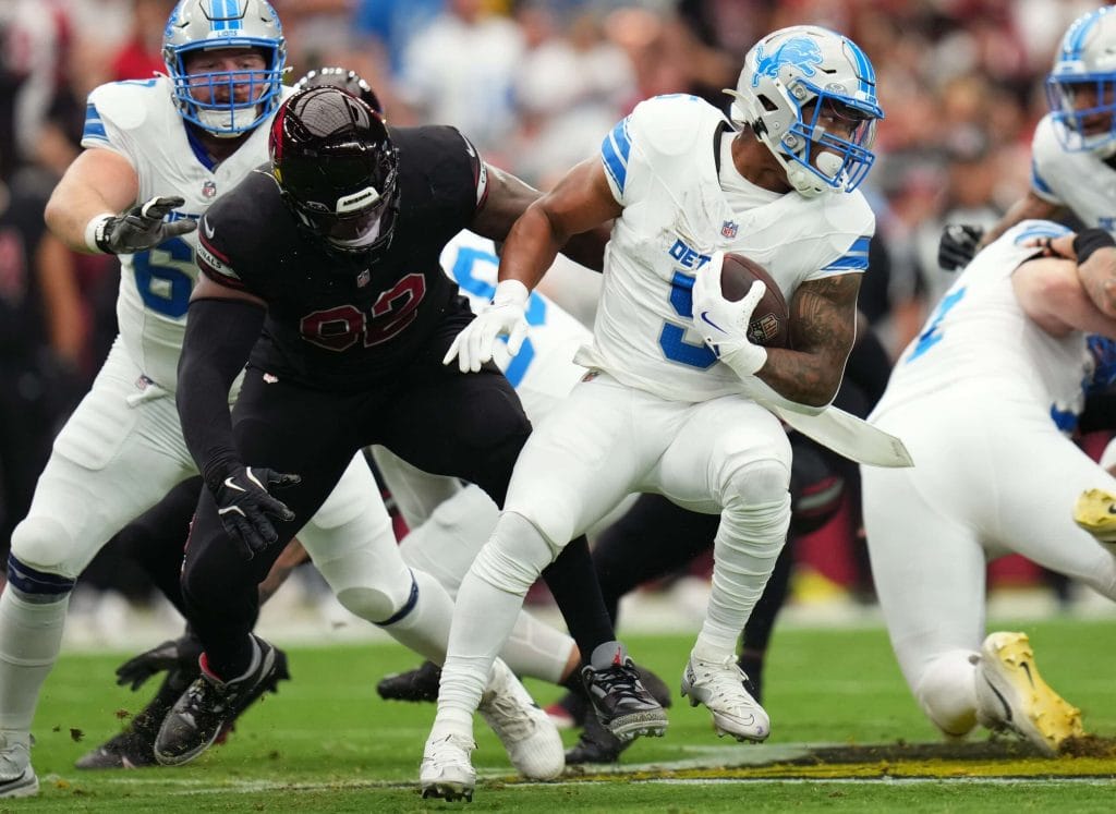 Arizona Cardinals defensive lineman Bilal Nichols (92) tackles Detroit Lions running back David Montgomery (5) at State Farm