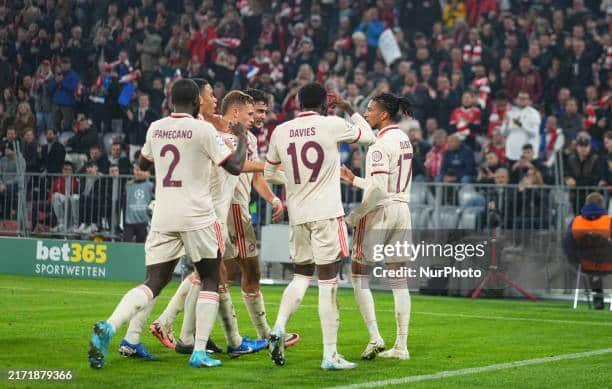 bayern players celebrating with olise who scores after harry kane