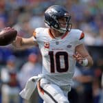 Bo Nix attempts a pass against the Seattle Seahawks.