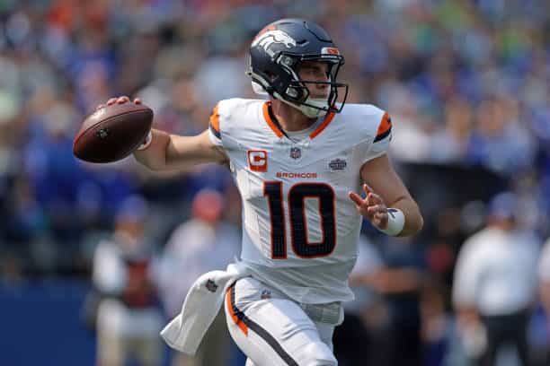 Bo Nix attempts a pass against the Seattle Seahawks.