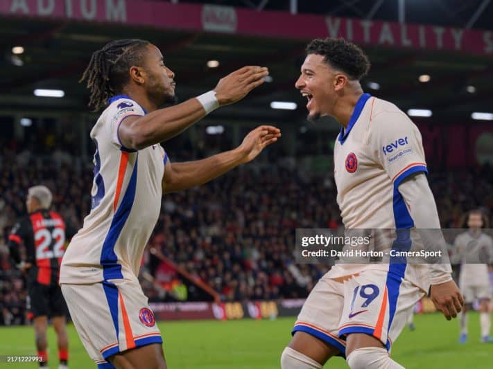 Sancho and Nkunku celebrate after scoring at Bournemouth vs Chelsea