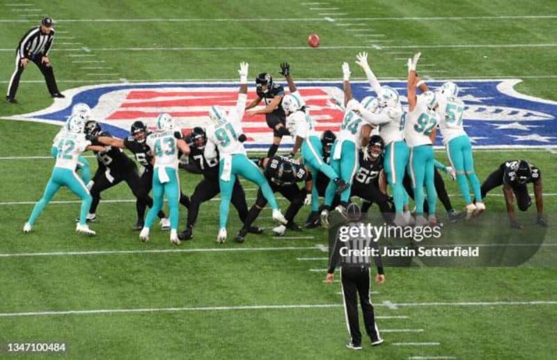 LONDON, ENGLAND - OCTOBER 17: Matthew Wright #15 of Jacksonville Jaguars kicks the winning field goal to win the NFL London 2021 match between Miami Dolphins and Jacksonville Jaguars at Tottenham Hotspur Stadium on October 17, 2021 in London, England. (Photo by Justin Setterfield/Getty Images)