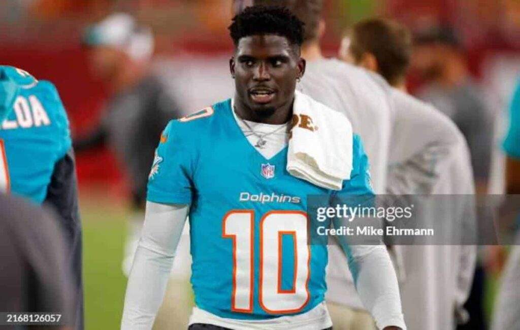 TAMPA, FLORIDA - AUGUST 23: Tyreek Hill #10 of the Miami Dolphins looks on during a preseason game against the Tampa Bay Buccaneers at Raymond James Stadium on August 23, 2024 in Tampa, Florida. (Photo by Mike Ehrmann/Getty Images)