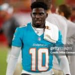 TAMPA, FLORIDA - AUGUST 23: Tyreek Hill #10 of the Miami Dolphins looks on during a preseason game against the Tampa Bay Buccaneers at Raymond James Stadium on August 23, 2024 in Tampa, Florida. (Photo by Mike Ehrmann/Getty Images)