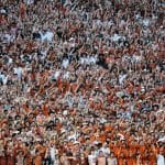 The Texas Longhorns were fined for the actions of their fans on Saturday.