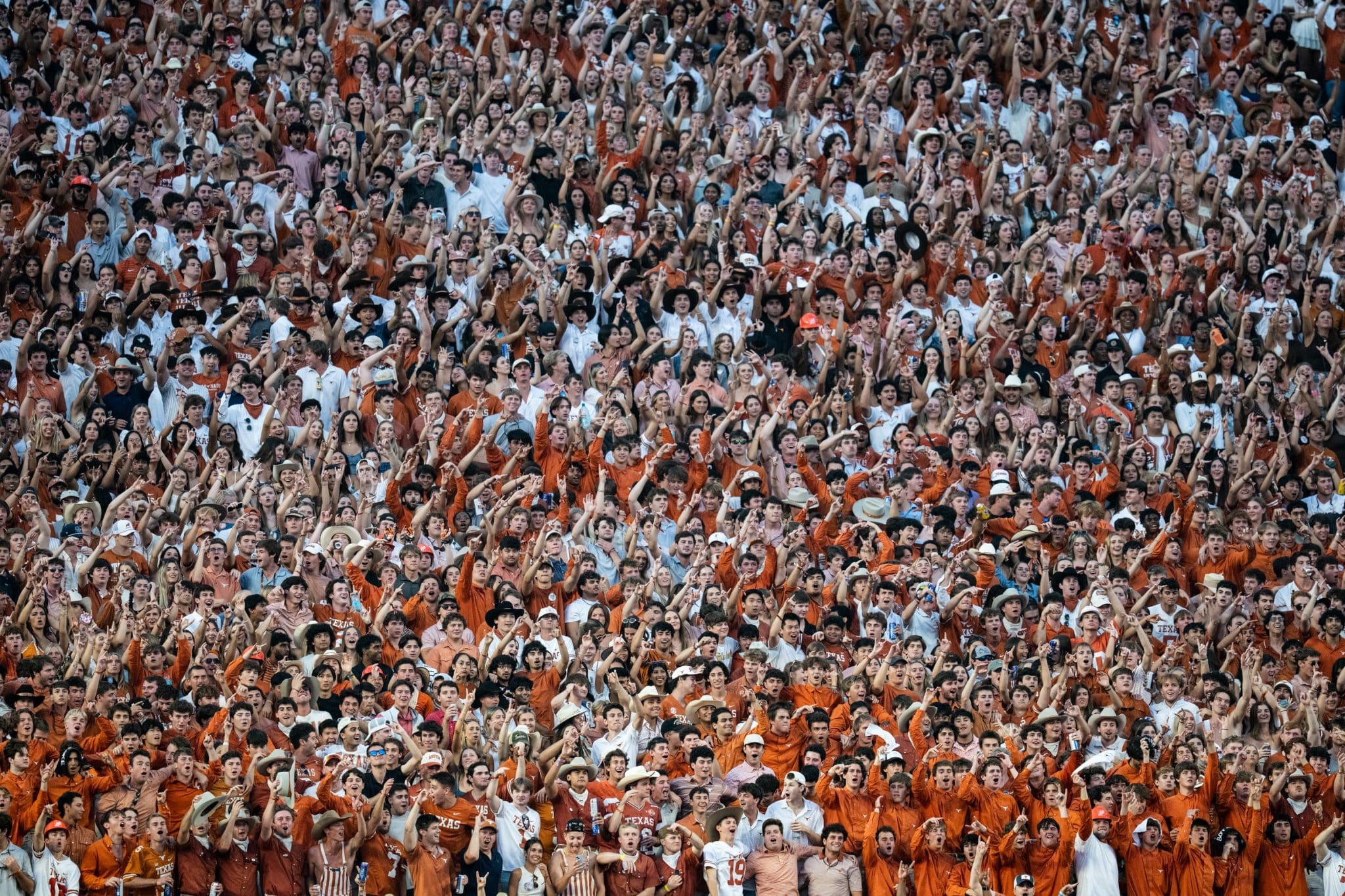 The Texas Longhorns were fined for the actions of their fans on Saturday.