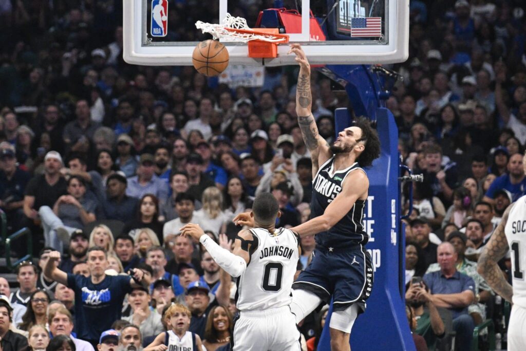 The Dallas Mavericks defeated the San Antonio Spurs to begin their season.