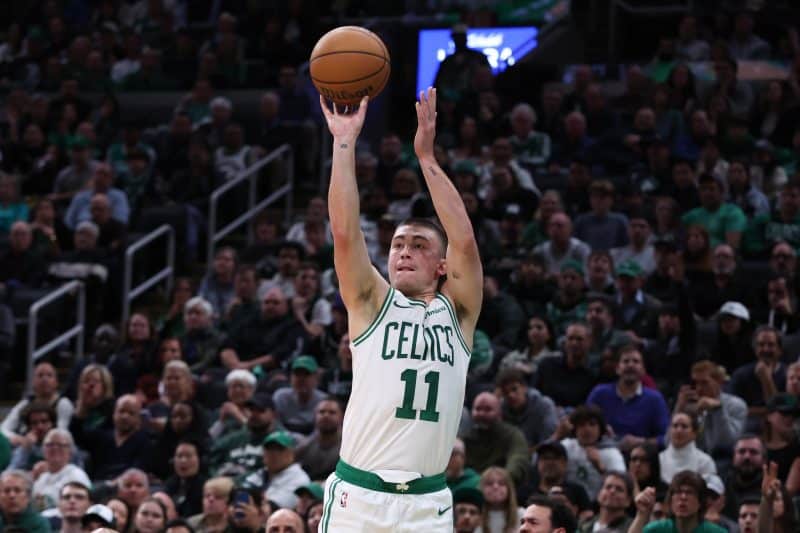 The Boston Celtics pulled away late to defeat the Milwaukee Bucks.