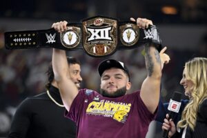 Arizona State RB Cam Skattebo celebrates winning the Big 12 Championship