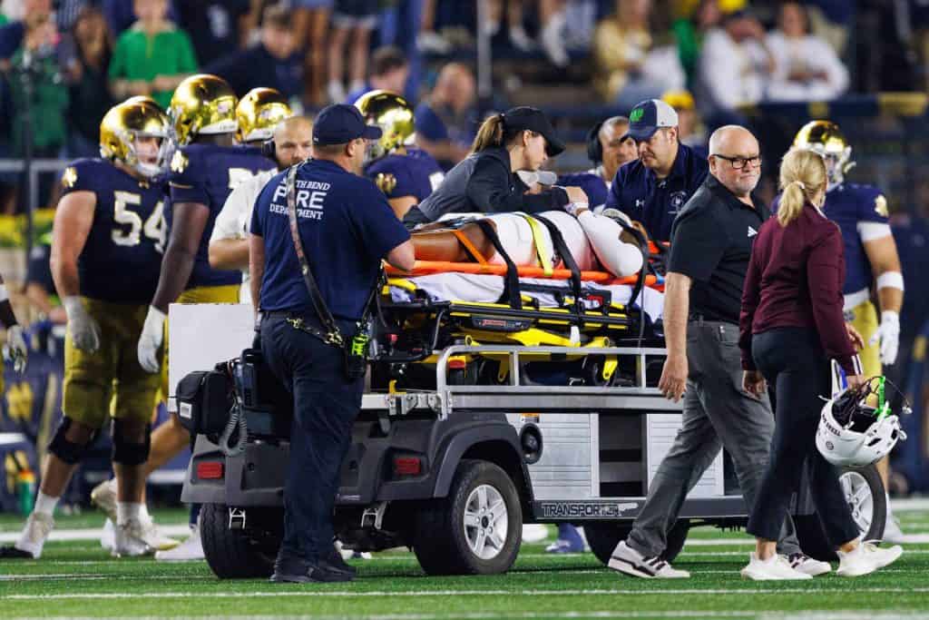 Texas A&M safety Bryce Anderson (1) is taken off the field in the first half of a NCAA football game against Notre Dame at