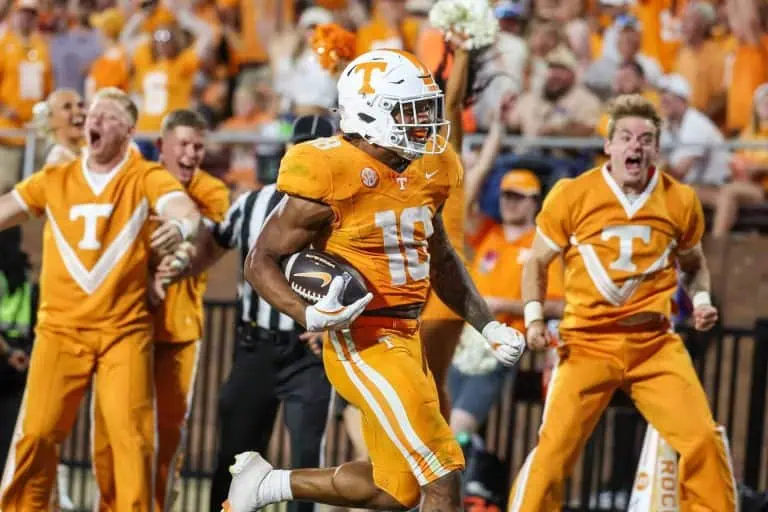 Tennessee Volunteers running back DeSean Bishop (18) runs for a touchdown during overtime against the Mississippi State Bulldogs at Davis Wade Stadium at Scott Field.