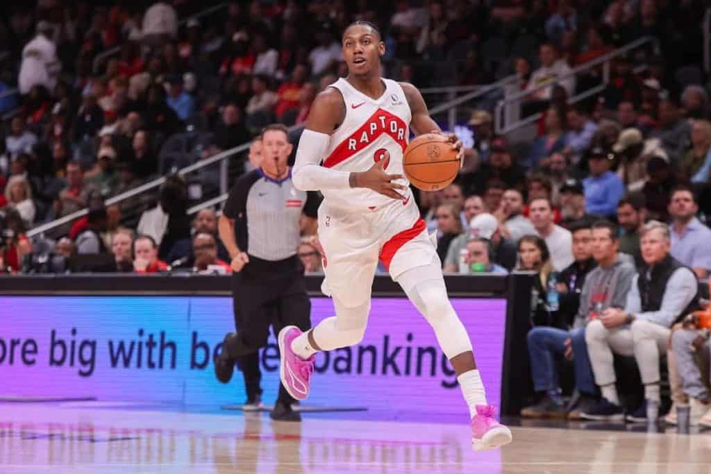 Toronto Raptors forward RJ Barrett (9) dribbles against the Atlanta Hawks in the fourth quarter at State Farm Arena.
