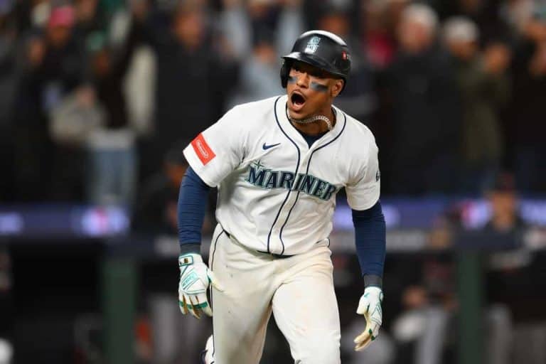 Jorge Polanco reacts to his game-winning single in the 15th inning for the Seattle Mariners, Detroit Tigers