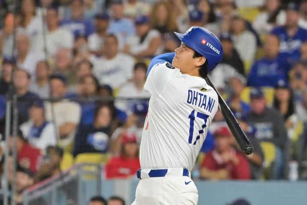 Shohei Ohtani hits a fifth inning homer for the Los Angeles Dodgers.