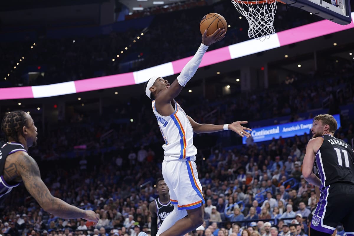 Oklahoma City Thunder guard Shai Gilgeous-Alexander drives for a layup against the Sacramento Kings.