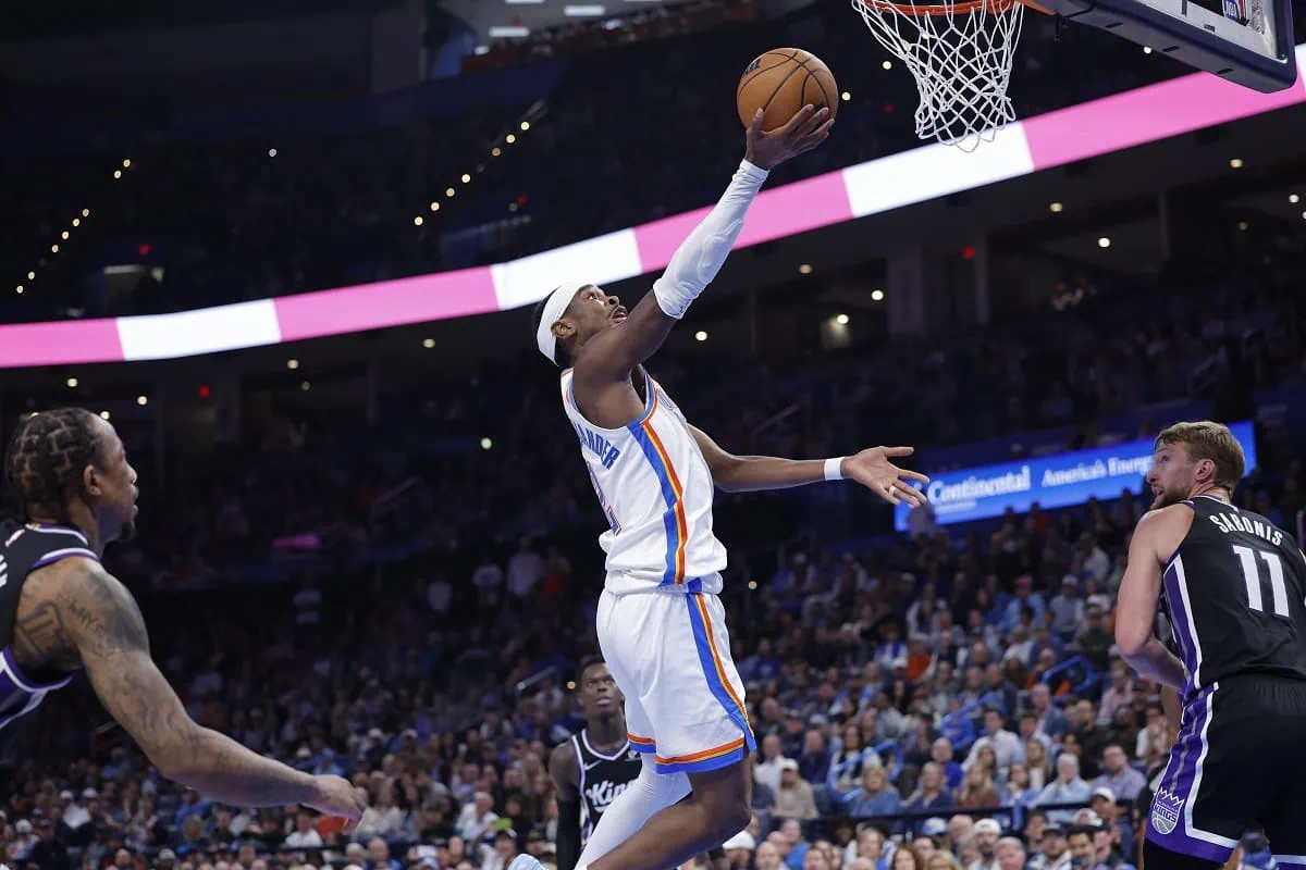 Oklahoma City Thunder guard Shai Gilgeous-Alexander drives for a layup against the Sacramento Kings.
