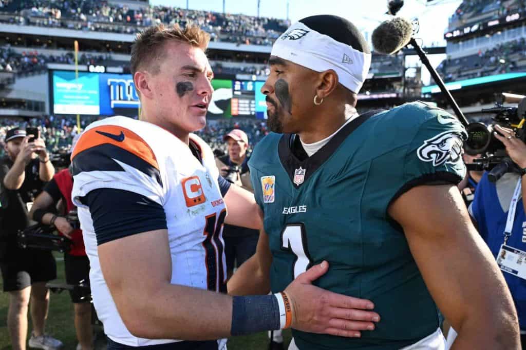 Bo Nix and Jalen Hurts after the Game
