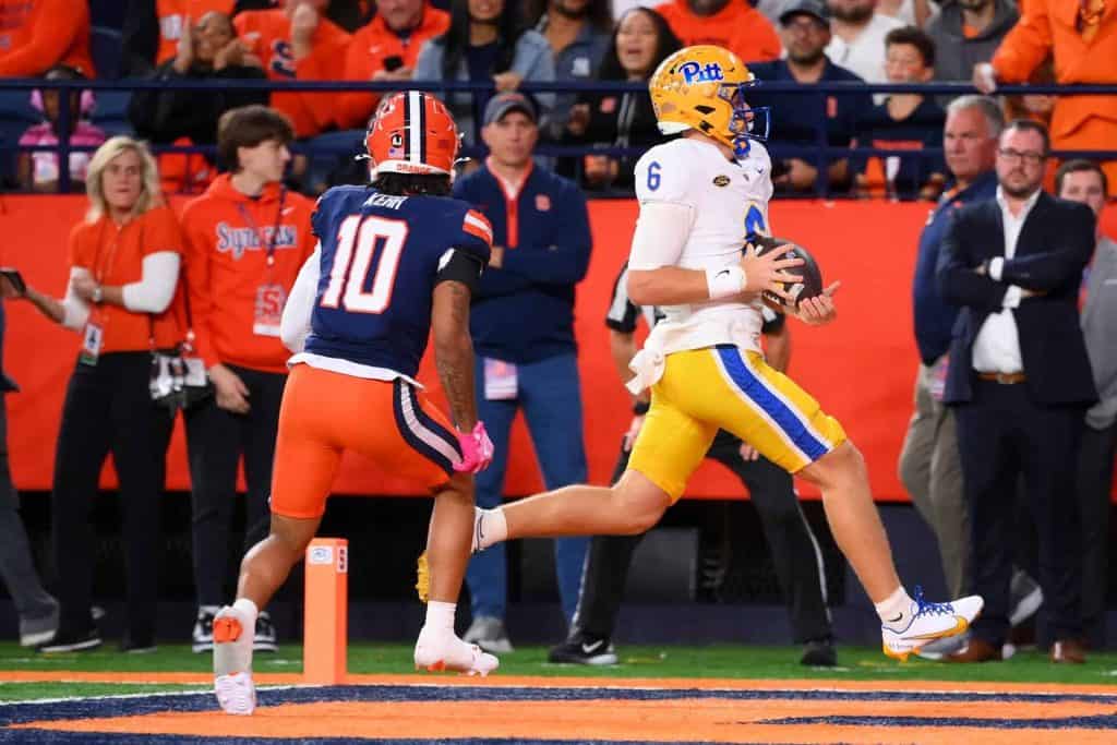 Pitt quarterback Mason Heintschel runs for a touchdown ahead of the Mason Heintschel injury at Virginia Tech