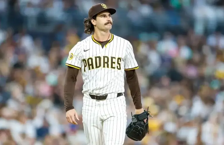 San Diego Padres starting pitcher Dylan Cease (84) reacts after walking a batter during the fourth inning against the Colorado Rockies at Petco Park.