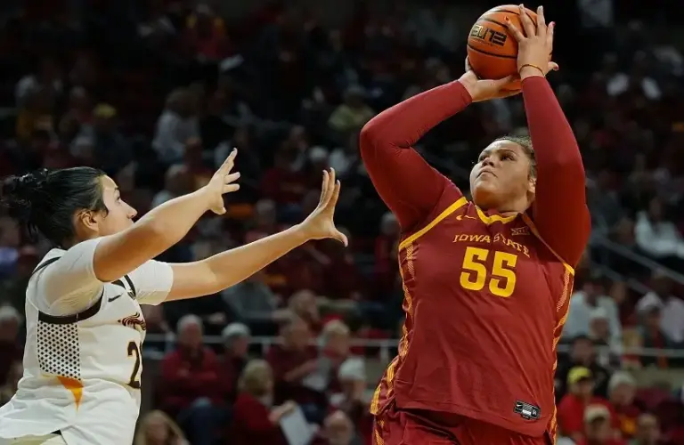 Iowa State Cyclones' center Audi Crooks (55) shoots the ball over over Valparaiso Beacons forward Milana Nenadic (21) during the first quarter on Nov. 12, 2025, at Hilton Coliseum in Ames, Iowa.