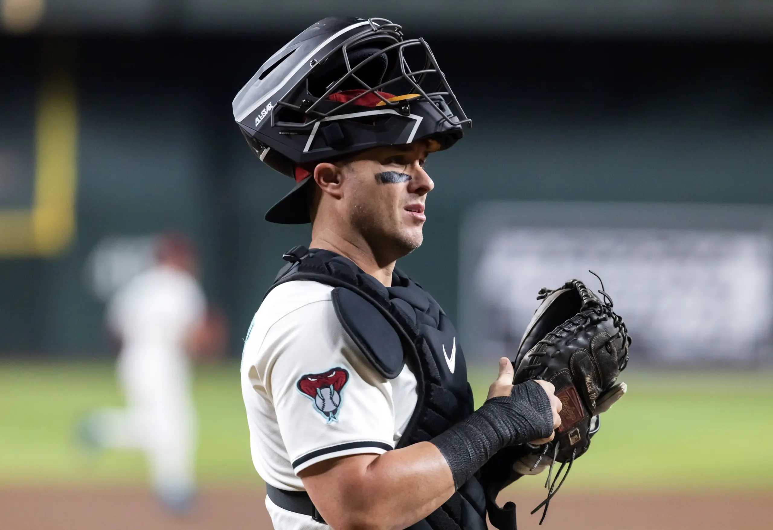 Arizona Diamondbacks catcher James McCann looking into the dugout