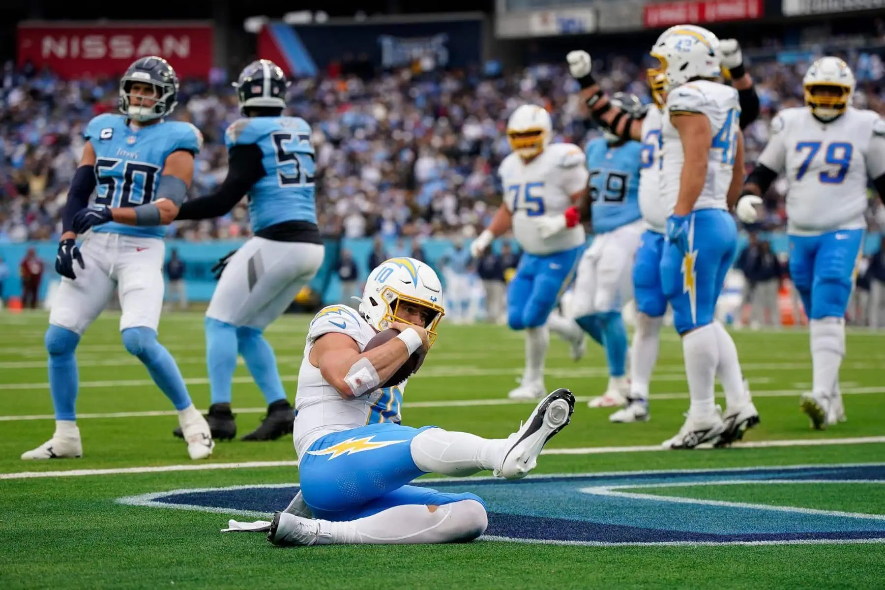 Los Angeles Chargers quarterback Justin Herbert scores a touchdown against the Tennessee Titans at Nissan Stadium in Nashville, Tenn. Image by: Andrew Nelles / The Tennessean / USA TODAY NETWORK via Imagn Images
