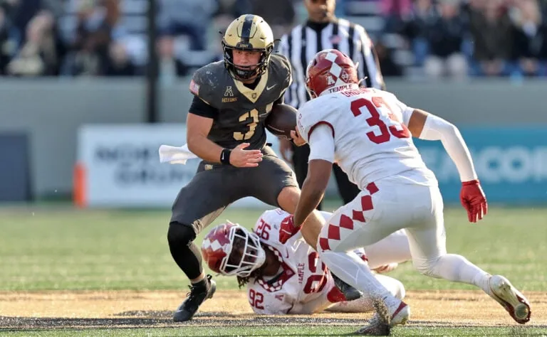Army Black Knights quarterback Cale Hellums (3) runs against the Temple Owls during the second half at Michie Stadium. Image by: Danny Wild-Imagn Images