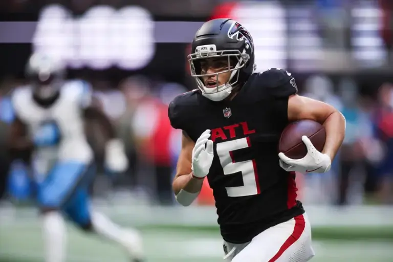 Atlanta Falcons wide receiver Drake London running after the catch