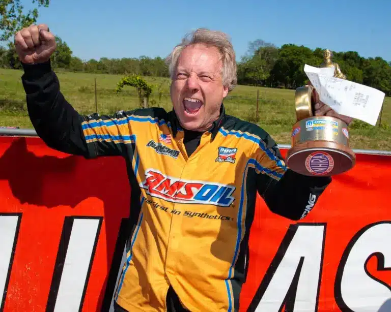 Apr 14, 2019; Baytown, TX, USA; NHRA mountain motor pro stock driver John DeFlorian celebrates after winning the Springnationals at Houston Raceway Park. Mandatory Credit: Mark J. Rebilas-Imagn Images