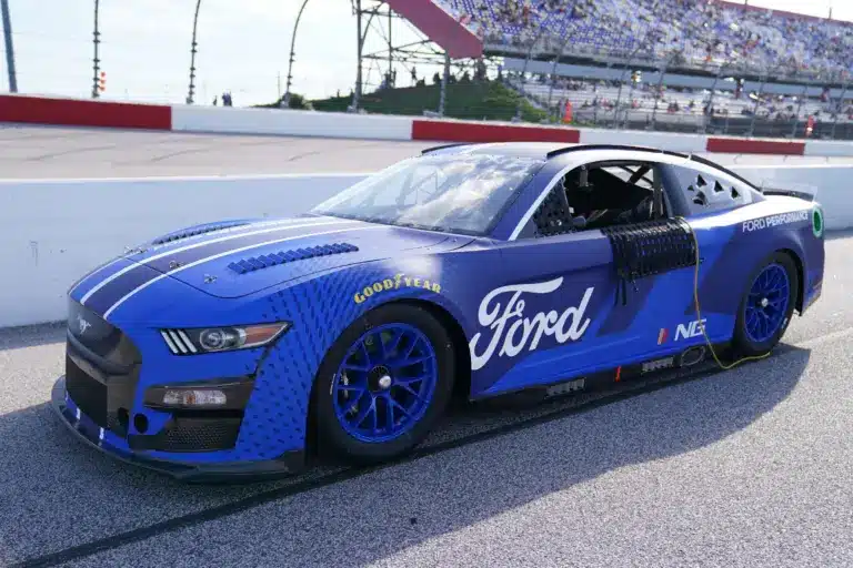 Sep 5, 2021; Darlington, South Carolina, USA; A general view of the 2022 Next Gen Ford Mustang race car on the grid prior to the Cook Out Southern 500 at Darlington Raceway. Mandatory Credit: Jasen Vinlove-Imagn Images