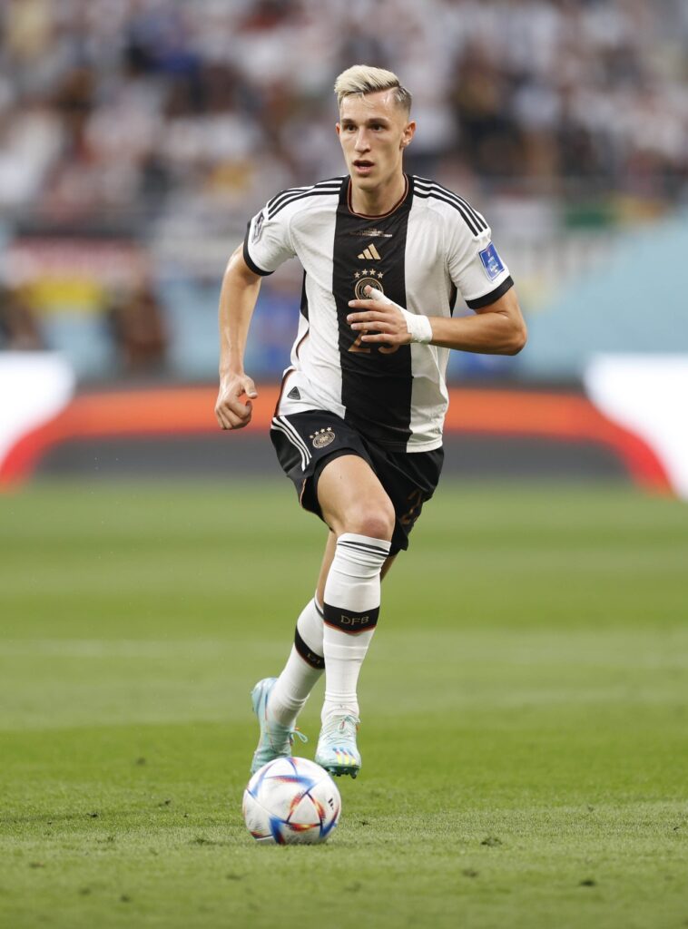 Nov 23, 2022; Doha, Qatar; Germany defender Nico Schlotterbeck (23) during a group stage match during the 2022 World Cup against Japan at Khalifa International Stadium. Mandatory Credit: Yukihito Taguchi-Imagn Images