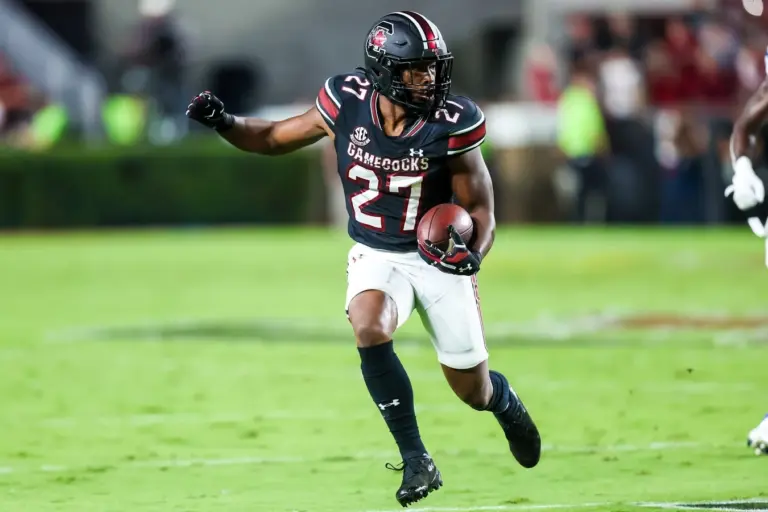 Sep 27, 2025; Columbia, South Carolina, USA; South Carolina Gamecocks running back Oscar Adaway III (27) rushes against the Kentucky Wildcats at Williams-Brice Stadium. Mandatory Credit: Jeff Blake-Imagn Images