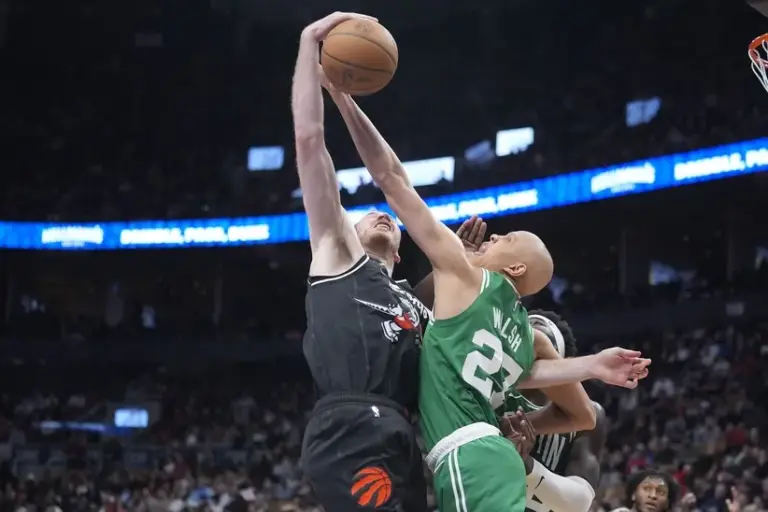 The Boston Celtics hung on to defeat the Raptors.
