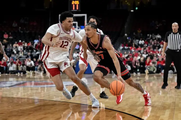 Houston Beats Arkansas.