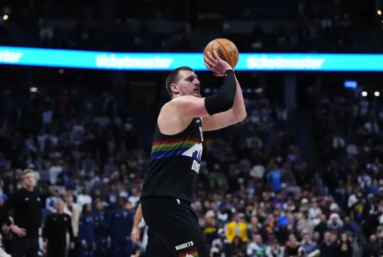 Nuggets defeat Wolves in NBA thriller.