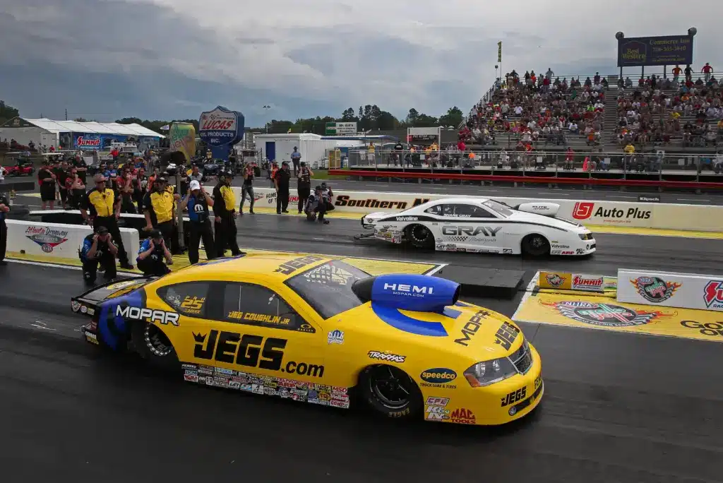 May 11, 2013; Commerce, GA, USA: NHRA pro stock driver Jeg Coughlin Jr (near) alongside Shane Gray during the Southern Nationals at Atlanta Dragway. Mandatory Credit: Mark J. Rebilas-Imagn Images
