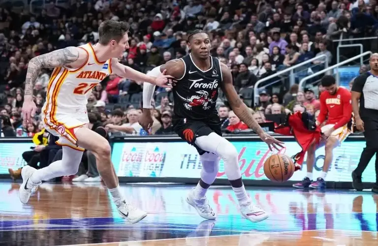 Toronto Raptors forward RJ Barrett (9) controls the ball as Atlanta Hawks guard Vit Krejci (27) tries to defend during the fourth quarter at Scotiabank Arena.