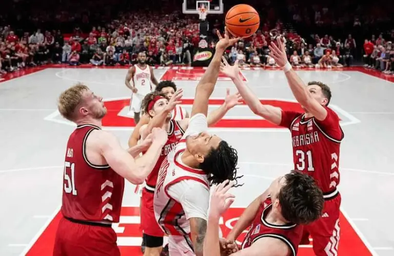 Ohio State Buckeyes forward Devin Royal (21) reaches for a rebound between the Nebraska Cornhuskers team during the second half of the NCAA men's basketball game at the Schottenstein Center in Columbus on Jan. 5, 2026. Ohio State lost 72-69 right before the Oregon game.